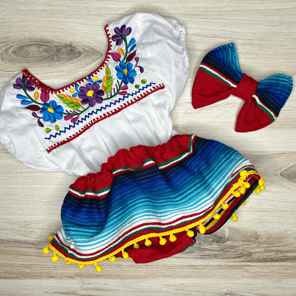 Mexican Sarape Skirted Bummie w/ Pom Poms Mexican Sarape Skirted Bummie w/ Pom Poms