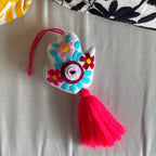 Evil Eye Hand Pom-Pom - Ojo Turco Evil Eye Hand Pom-Pom - Ojo Turco