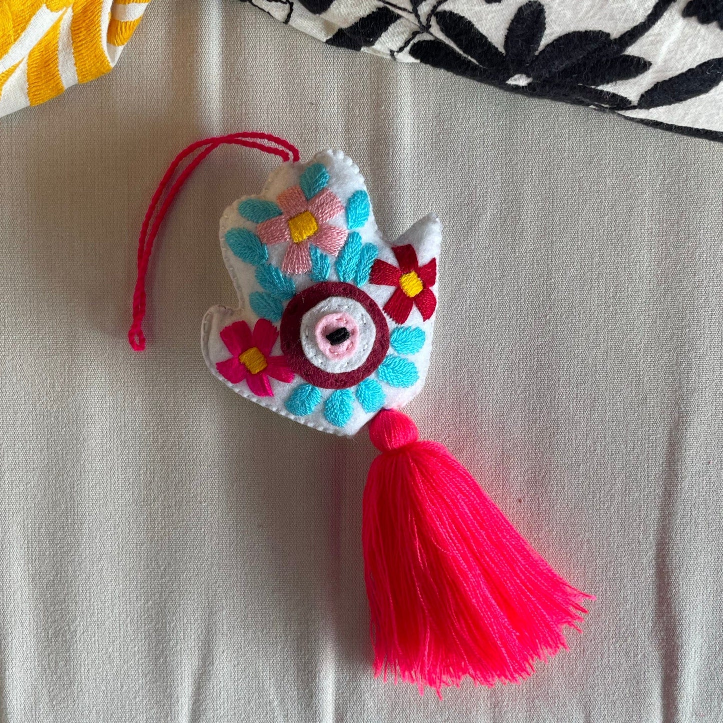 Evil Eye Hand Pom-Pom - Ojo Turco Evil Eye Hand Pom-Pom - Ojo Turco