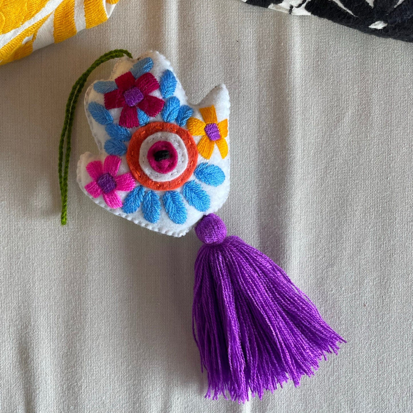 Evil Eye Hand Pom-Pom - Ojo Turco Evil Eye Hand Pom-Pom - Ojo Turco