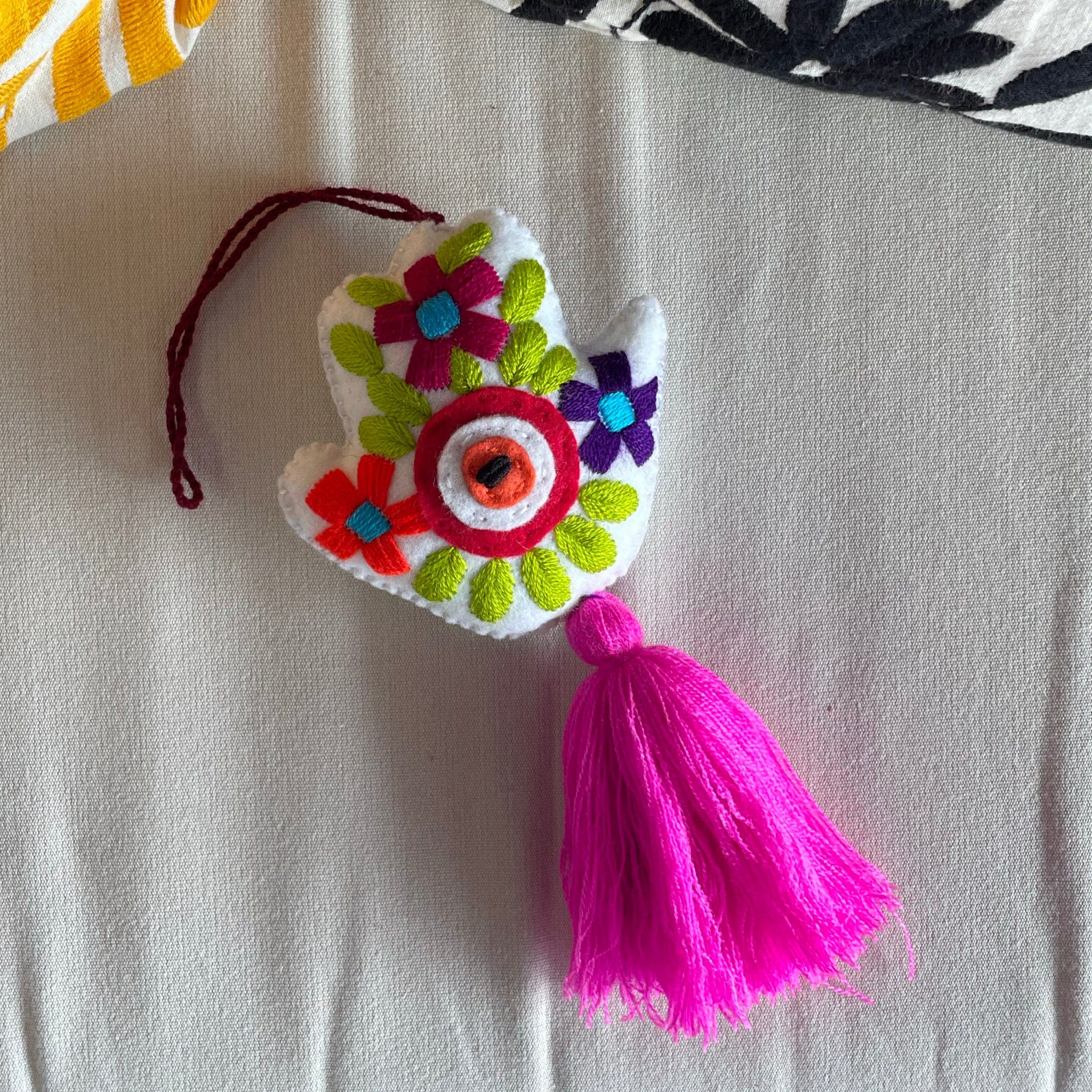 Evil Eye Hand Pom-Pom - Ojo Turco Evil Eye Hand Pom-Pom - Ojo Turco