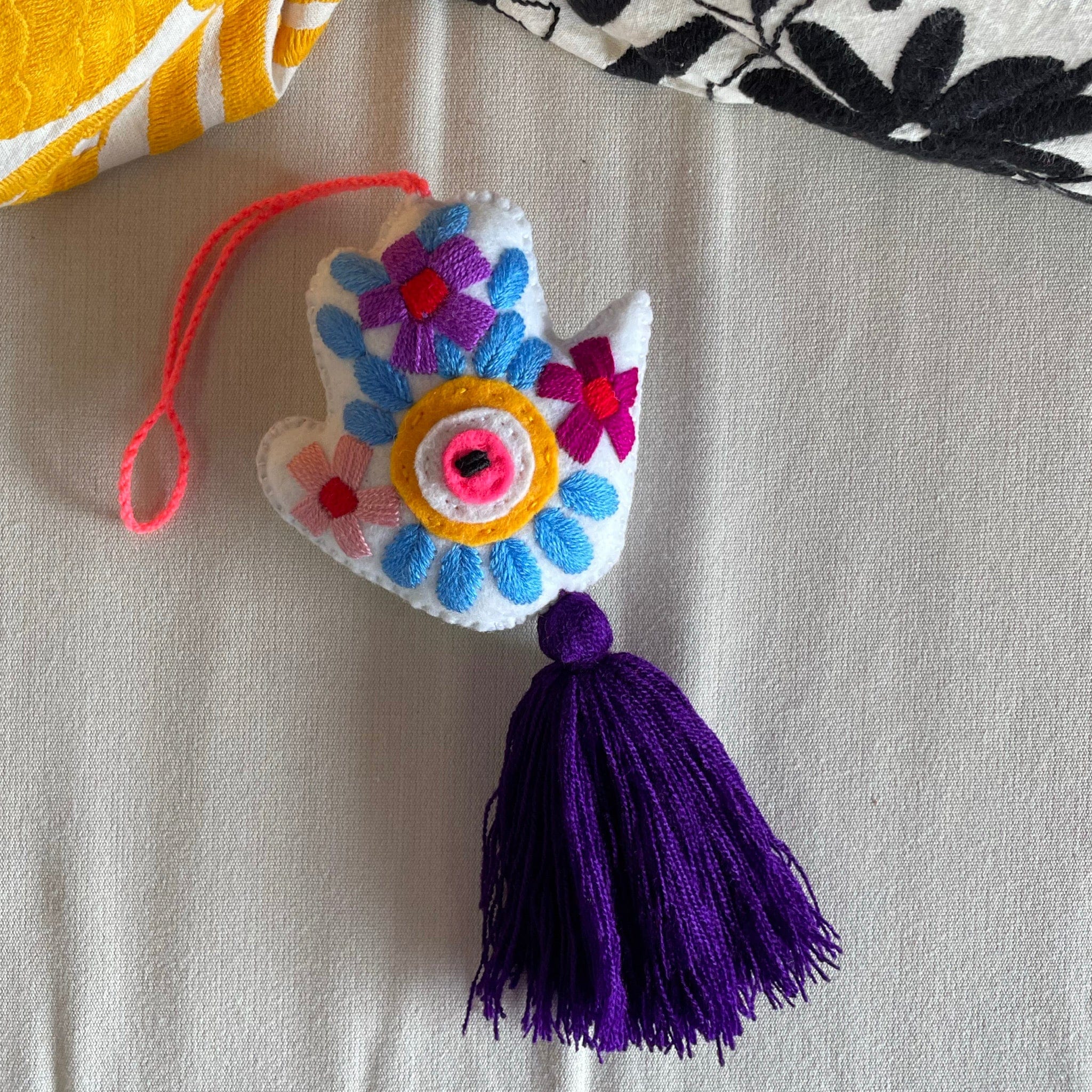 Evil Eye Hand Pom-Pom - Ojo Turco Evil Eye Hand Pom-Pom - Ojo Turco