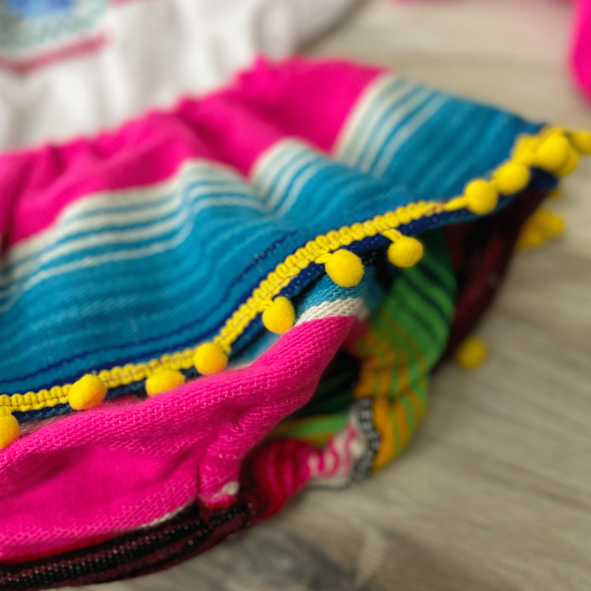 Mexican Sarape Skirted Bummie w/ Pom Poms Mexican Sarape Skirted Bummie w/ Pom Poms