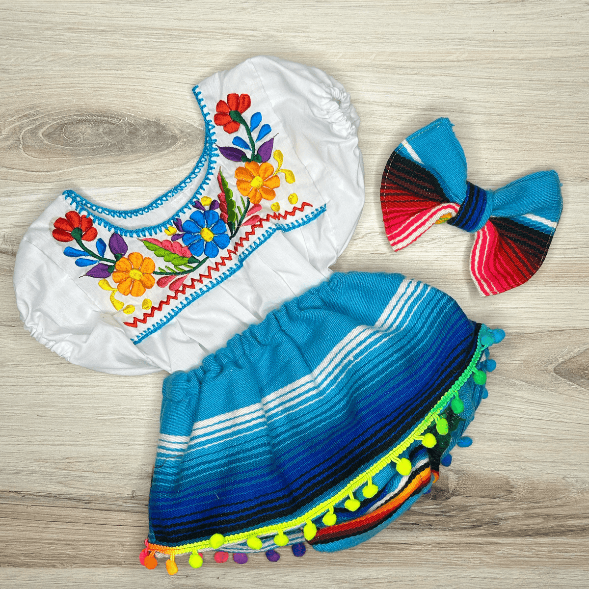 Mexican Sarape Skirted Bummie w/ Pom Poms Mexican Sarape Skirted Bummie w/ Pom Poms